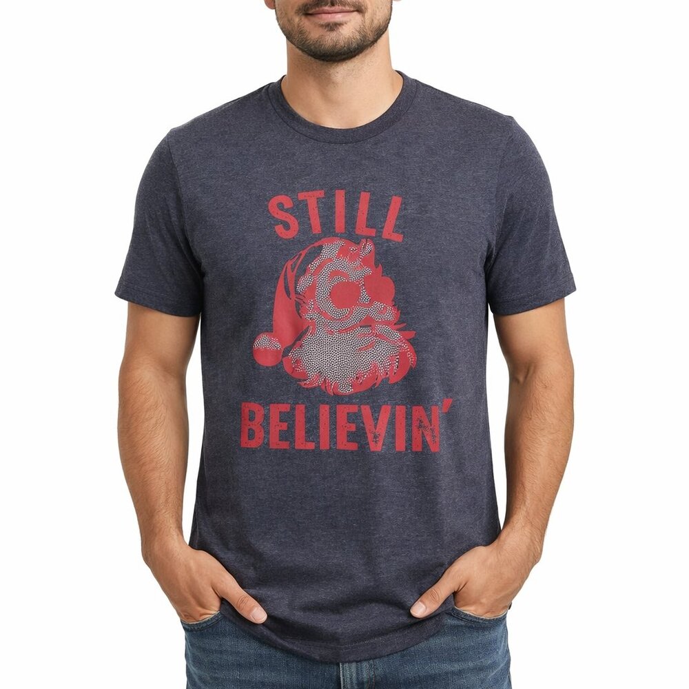 Heather Blue Tee with Red Santa “Still Believin’” Graphic Size M